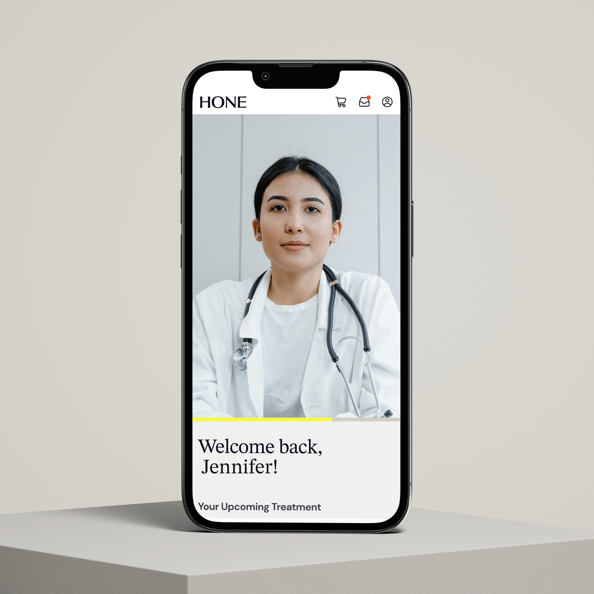 Hone Health website on a phone welcoming a patient back and featuring a doctor.